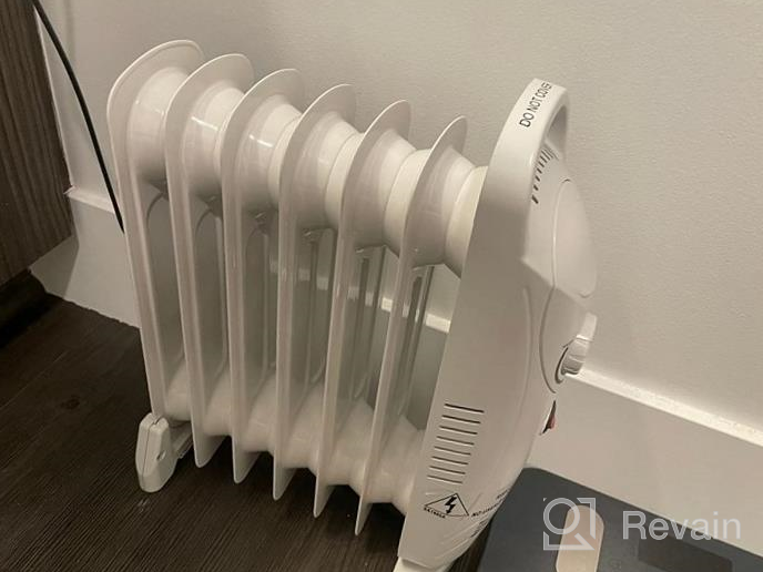 img 1 attached to Stay Cozy With Our Quiet Electric Oil Heater - 700W Radiator With Overheat Protection And 2 Heat Settings For Indoor Use In Bedroom, Office, And Home review by Ricardo Anderson