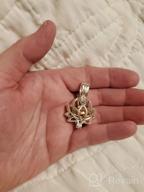 img 1 attached to Lotus Flower Shaped Cremation Jewelry Urn Pendant Necklace for Ashes review by Elizabeth Adams
