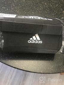 img 6 attached to Обувь Adidas Traxion в белом и черном цветах - превосходное сцепление для спортивной производительности.