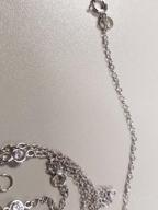 img 1 attached to Stunning Amazon Essentials Sterling Silver AAA Cubic Zirconia Station Necklace – Sparkle with Elegance! review by Steven Jackson