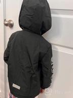 img 1 attached to Waterproof Hooded Rain Jacket for Kids - Lightweight Fleece Lined Coat for Boys and Girls - Windbreaker Raincoat review by Devon Dober