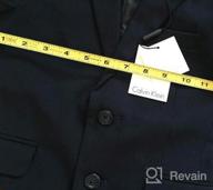 img 1 attached to 👔 Stylish Calvin Klein Boys' Bi-Stretch Blazer Suit Jacket: 2-Button Single Breasted, Buttoned Cuffs & Front Flap Pockets review by James Hova
