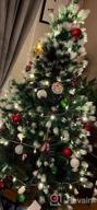 картинка 1 прикреплена к отзыву Искусственная рождественская елка из заснеженной ели - 7 футов высотой, реалистичные ветки с красными ягодами и 1172 кончиками - зелено-белые от HOMCOM от Lisa Ramirez