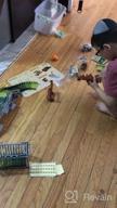img 1 attached to 159 Pcs Dinosaur Glow In The Dark Race Train Track Toy For Boys & Girls Ages 3-7 | DinoManiacs By JitteryGit review by Jared Surabhi