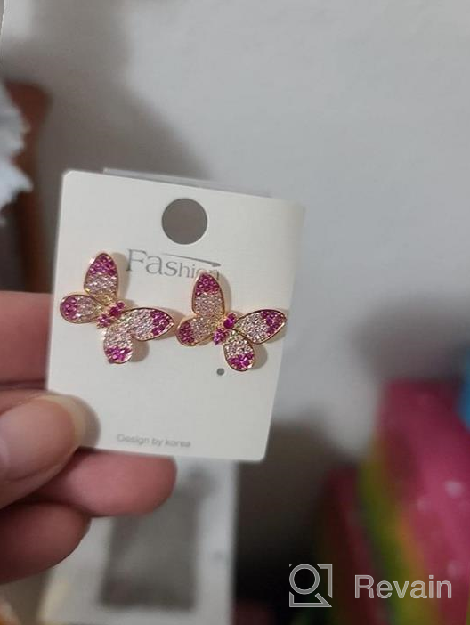 img 1 attached to Small Butterfly Stud Earrings Women review by Kimberly Elliott