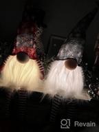 img 1 attached to Add Festive Charm With GMOEGEFT Scandinavian Christmas Gnome Lights Timer: Set Of 2 Dangling-Legged Tomte Gnomes In Nordic Plaid Pattern review by Marty Drury