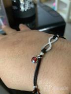 img 1 attached to 🍀 Lucky Infinity Love Bracelet - Sterling Silver Charm on Adjustable Black String Bangle for Couples & Teen Girls – Evil Eye Relationship Jewelry Gift review by Mario Hernandez