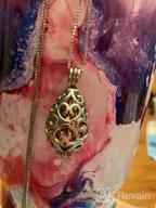 img 1 attached to Lotus Flower Shaped Cremation Jewelry Urn Pendant Necklace for Ashes review by Krystal Jones