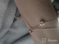 картинка 1 прикреплена к отзыву Тонкие браслеты с инициалами в виде сердечка Turandoss: персонализированное ювелирное изделие из позолоченного золота 14К для женщин и девочек. от Tiffany Lewis
