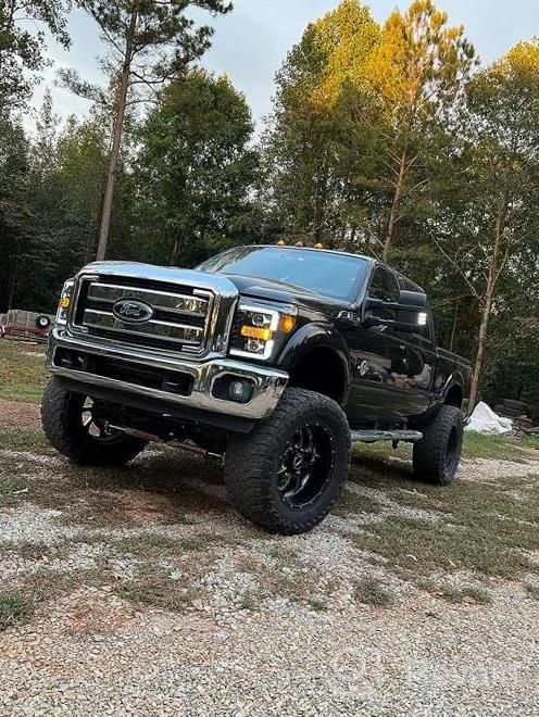 img 1 attached to AlphaRex Luxx-SERIES Black For 11-16 F250/F350/F450/F550 DRL/Sequential Signal LED/ Activation Light Tube Dual Super Duty 4Th Gen Look Switchback Projector Headlights review by Tyrone Narvaez