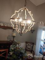 img 1 attached to Rustic Orb Chandelier With Adjustable Height - TZOE 4-Light Metal Vintage Chandelier For Dining Room, Living Room, And Kitchen review by Joel Gardner