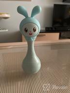 img 2 attached to 🎶 Blue Alilo Smarty Bunny Shake & Tell Musical Toy Rattle for Newborns and Infants - Soother with Lullaby Song Story, Music Player & Games review by Anastazja Kulka ᠌