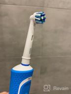 img 1 attached to 🪥 Oral-B Vitality D100.413.1 CrossAction Vibrating Toothbrush - Black, White, Blue review by Riko Long ᠌