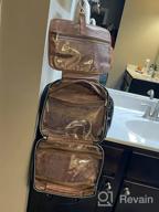 картинка 1 прикреплена к отзыву Кожаная водостойкая дорожная сумка для туалетных принадлежностей для женщин - большой органайзер для косметики с подвесным крючком, полноразмерный контейнер для аксессуаров и туалетных принадлежностей от Luis Nelson
