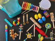 img 1 attached to Wooden Percussion Instruments Toy Set - Educational Musical Toys For Kids, Babies & Toddlers With Storage Bag review by Nick Gathings