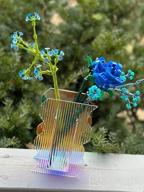 img 1 attached to Iridescent Acrylic Flower Vase With Rainbow Colors, Ideal For Home And Wedding Decor, Contemporary Design For Living Room, Bedroom And Shelf, Perfect Gift - Long Wavy review by Steven Guevara