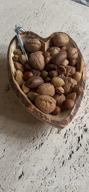 картинка 1 прикреплена к отзыву Handcrafted Heart-Shaped Bowl Made Of Eco-Friendly Mango Wood With Bark от Zach Clements