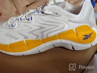 картинка 1 прикреплена к отзыву Experience Ultimate Comfort with Reebok Unisex Kinetica Sneaker Bright от Jay Brock