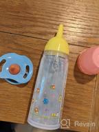 img 1 attached to IVITA Baby Doll Feeding Set: Disappearing Milk And Juice Bottles For Realistic Playtime review by Mike Skinner