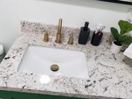 img 1 attached to TRUSTMI Brass Pop Up Sink Drain Stopper with Overflow - Brushed Gold Bathroom Faucet Vessel Vanity Sink Drainer: Stylish and Functional! review by Taj Tyagi