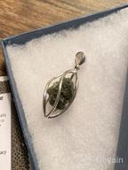 img 1 attached to Sterling Silver Cage Pendant with Rough Gemstone review by Jack Watkins