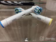 img 1 attached to 💡 4 Pack of Oral-B Cross Action Electric Toothbrush Replacement Brush Heads review by Akihiko Kichiro ᠌
