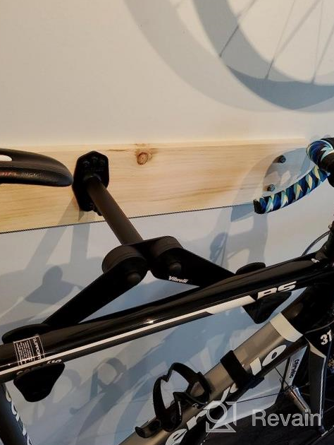 img 1 attached to Vibrelli Bike Wall Mount: Horizontal Storage Rack For Hanging Bicycles In Home Or Garage - Adjustable Hooks For Mountain, Road & Hybrid Bikes review by Kino Gerami