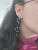 img 1 attached to 🌙 MINIDUO Exaggerated Fashion Long Drop Dangle Stud Drop Earrings for Women Girls with Moon and Star Design review by Pamela Warfield