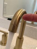 картинка 1 прикреплена к отзыву Matte White Bathroom Faucet With 2 Handles, 360° Swivel Spout, And Metal Overflow Pop-Up Drain - 8 Inch Widespread Vanity Faucet Made Of Brass, By TRUSTMI от Joshua Reid