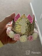 картинка 1 прикреплена к отзыву Полный набор декораций для первого дня рождения девочки в стиле принцессы - корона, баннер для стульчика, топпер для торта и цветочная корона - идеальные праздничные принадлежности для первого года ребенка. от Tim Shah