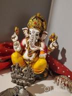img 1 attached to Marble Powder Lord Ganesh Ganpati Elephant Hindu God Statue: The Blessing, Colored & Enhanced With Gold, Handcrafted In India By Lightahead review by Stuart Dunn