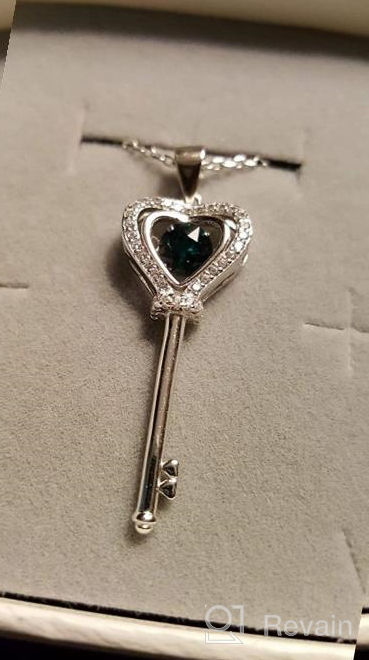 img 1 attached to 💖 XVX Beating Heart Key Necklace in 925 Sterling Silver with White Gold Plating, studded with Cubic Zirconia Dancing Birthstone Pendant, Perfect Forever Love Jewelry Gift for Women and Girls review by Matthew Oumer