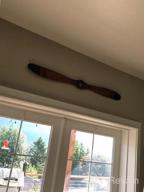 img 1 attached to Aviation-Inspired Wooden Propeller Wall Decor With 2 Blades And Detailed Design, 48" X 2" X 5", In Brown By Deco 79 review by Dawn Kraft