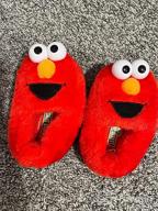 img 1 attached to Sesame Street Toddler Slippers: Elmo, Cookie Monster, Big Bird, Abby Cadabby - Character Print Comfy Footwear review by Deandre Kamaludin