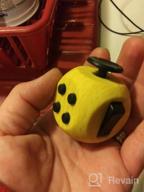 картинка 1 прикреплена к отзыву Chuchik Toys Fidget Cube - Игрушка премиум-класса для снятия стресса для детей и взрослых с 12 сторонами, уменьшает беспокойство и улучшает фокусировку - идеально подходит для аутизма, СДВГ, СДВГ и ОКР - черный и оранжевый цвет - 1 упаковка от Ben Cooper