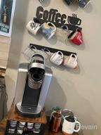 картинка 1 прикреплена к отзыву Настенная подставка для кофейных кружек HULISEN: 12 прочных крючков, металлический знак и нержавеющая вешалка для чайных чашек для кухни, офиса и бара от Kyle Earley