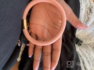 img 1 attached to Large Round Circle Wristlet Bracelet Bangle Wallet Keychain - Coolcos Portable Handy Wrist Keys Card Holder Keyrings review by Abhinav Drury