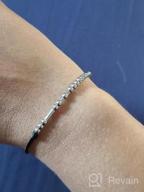 img 1 attached to Morse Code Inspiration: Trendy String Bracelets For Him, Her & Loved Ones review by Cameron Kennedy