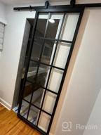 img 1 attached to 🚪 DIYHD TSD01 30x80" Sliding Barn Door with Black Frame and Clear Tempered Glass Panel - Prehung Assembled Glass Door Slab review by Derrick Shaw