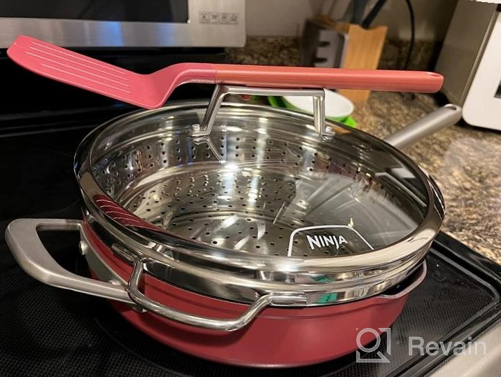 img 1 attached to Ninja CW102RD NeverSticking Premium PossiblePan Set - Including 4-Quart Capacity Pan, Glass Lid, Steamer/Strainer Basket, & Integrated Spatula review by Dave Neal