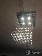 картинка 1 прикреплена к отзыву Светильник Saint Mossi Crystal Rain Drop K9 – современный и современный потолочный подвесной светильник. Размеры: H22 х W16 х L16, подходит для установки в комнате, спальне или гостиной. от David Merculief
