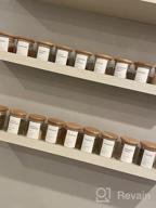 картинка 1 прикреплена к отзыву Giftgarden Woodgrain Picture Ledge Shelf Set - 24 Inch Black Floating Shelves for Storage in Home and Office, Set of 3 Different Sizes от John Gray
