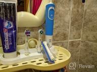 img 1 attached to 💪 White Oral-B Vitality Electric Toothbrush with FlossAction for Improved Oral Health review by Bima ᠌