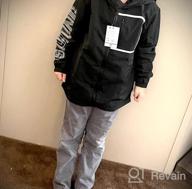 img 1 attached to Waterproof Hooded Rain Jacket for Kids - Lightweight Fleece Lined Coat for Boys and Girls - Windbreaker Raincoat review by Roy Reeves