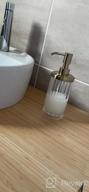 img 1 attached to 2 Pack MDesign Clear/Soft Brass Fluted Plastic Soap Dispensers For Bathroom Vanity, Kitchen Sink - Refillable Pump Bottles For Hand Soap, Dish Soap, Essential Oils, Ivey Collection review by Kerri Edwardz