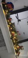 img 1 attached to 6FT PreLit Christmas Garland With Pine Cones, Red Berries, Bowknot, And Partial Flocking - Perfect Xmas Holiday Decorations With 50 Lights From AISENO Artificial review by Darin Brooks