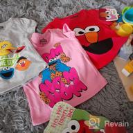 img 1 attached to Playful Trio: Sesame Street T-Shirt 3-Pack featuring Elmo, Big Bird & Cookie Monster review by Tammy Smith