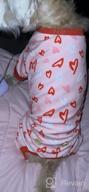 картинка 1 прикреплена к отзыву ❤️ KYEESE Valentine's Day Dog Pajamas: Pink Heart Patterned PJs for Small Dogs - Soft, Stretchable Velvet Onesie for Holiday Comfort от Luis Blaschko