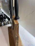 img 1 attached to Efficiently Organize Your Knives With Uniharpa'S Double Sided Magnetic Knife Block review by John Galbraith