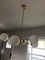 img 1 attached to Liara Caserti Black Sputnik Chandelier - Modern Ceiling Light with 6 Glass Globe Lights - Mid Century Modern Chandelier for Dining Room, Kitchen, Bedroom - Sputnik Light Fixture, UL Listed review by Jerome Pernell